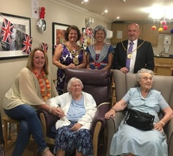 Clockwise from left: Cheryl Green (Home Manager), Mayor of Kirklees Gwen Lowe, Linda Stott (entertainer), Mayorâ€™s Consort Ken Lowe, Jean Taylor and Alice Hirst residents at Ashworth Grange.